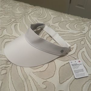 Brand New White Lululemon Visor. Silver logo on the side.
